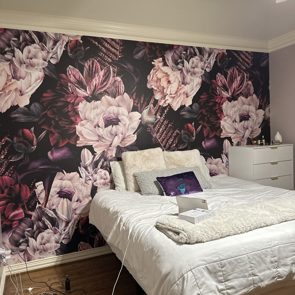Elegant residential wallpaper installation in a luxury home